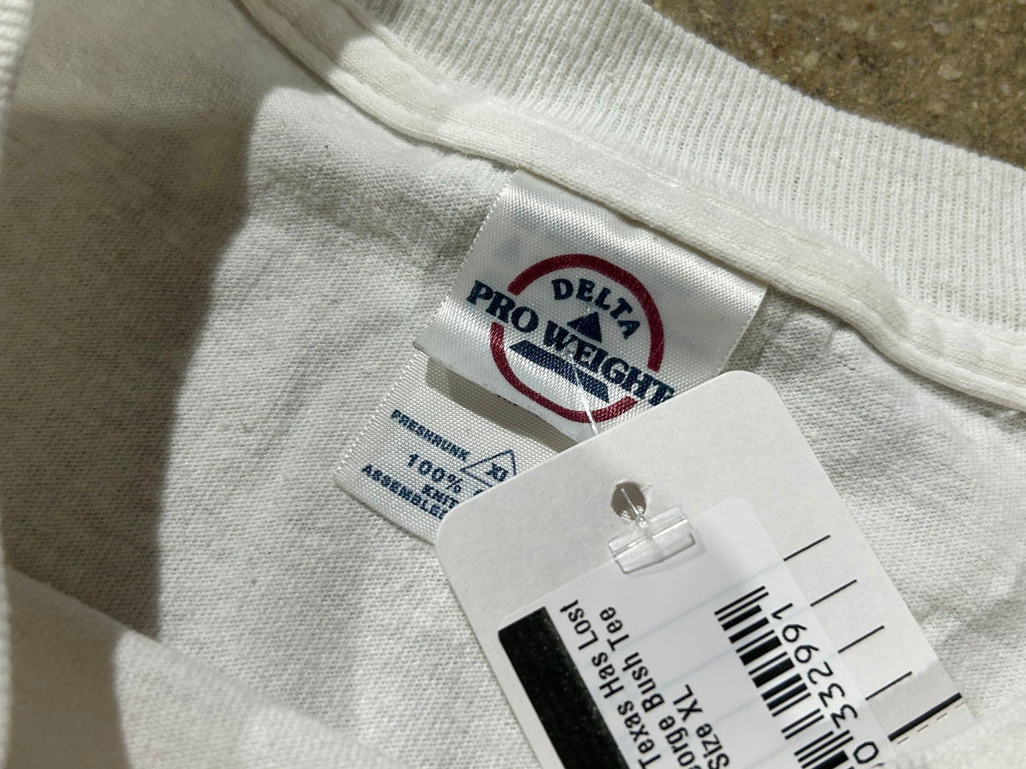 A Village In Texas Has Lost Its Idiot George Bush Tee - White Size XL