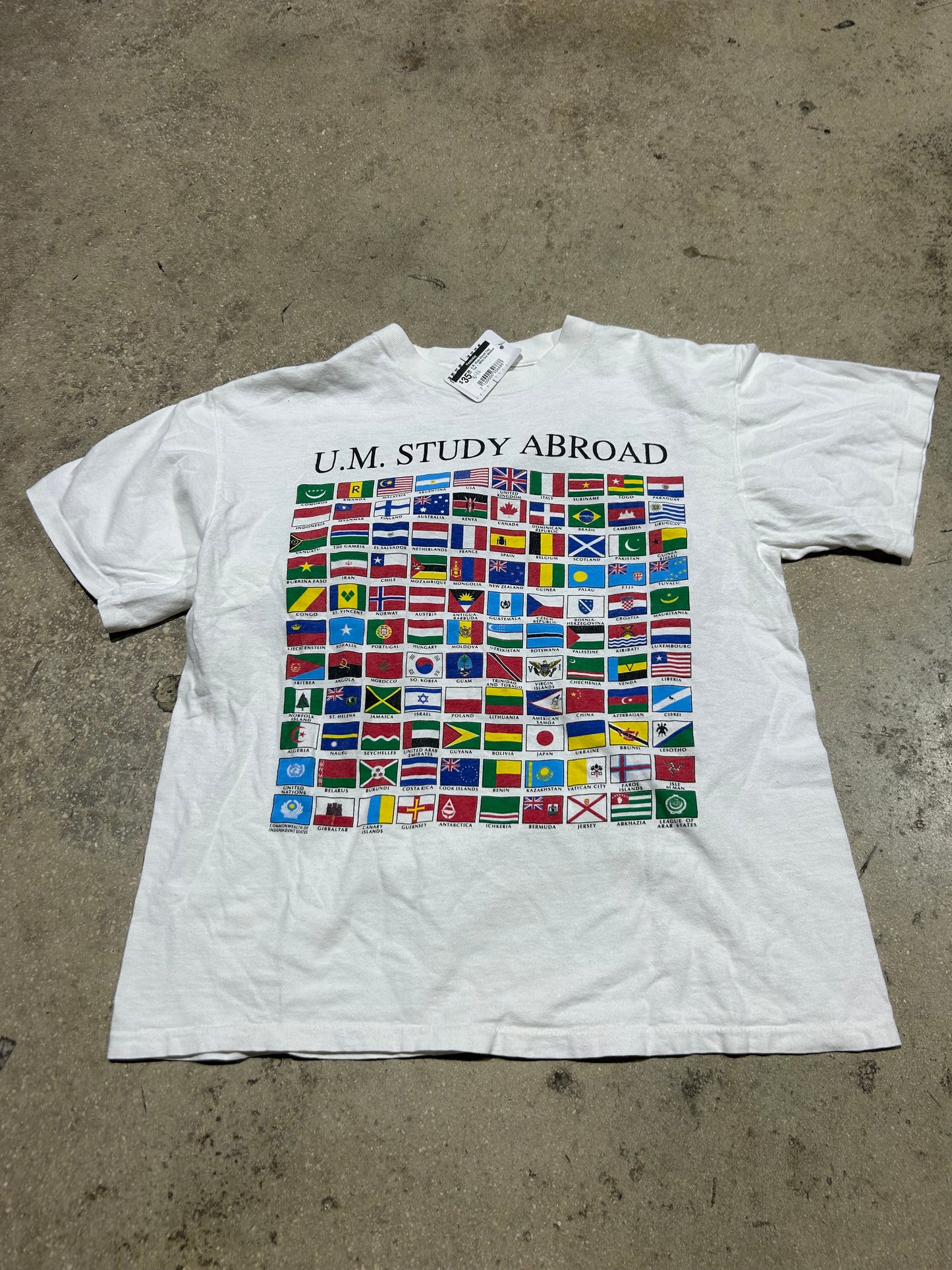U.M. Study Abroad Flag Tee - White Size Medium