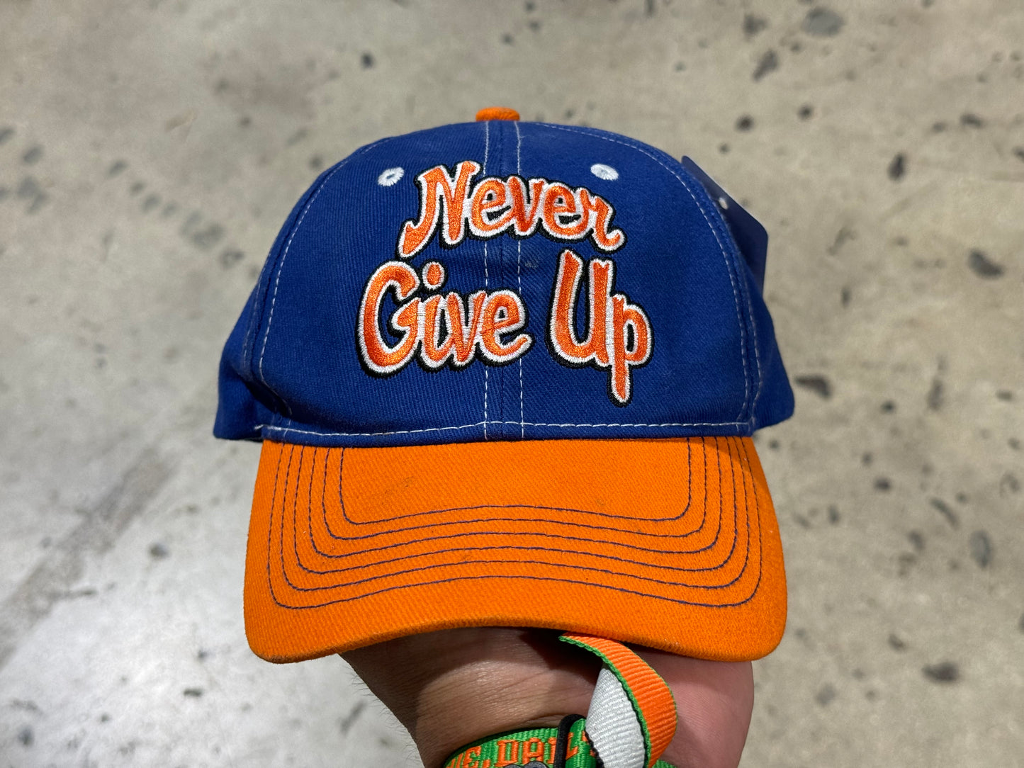 WWE John Cena Never Give Up Strapback Hat - Blue/Orange