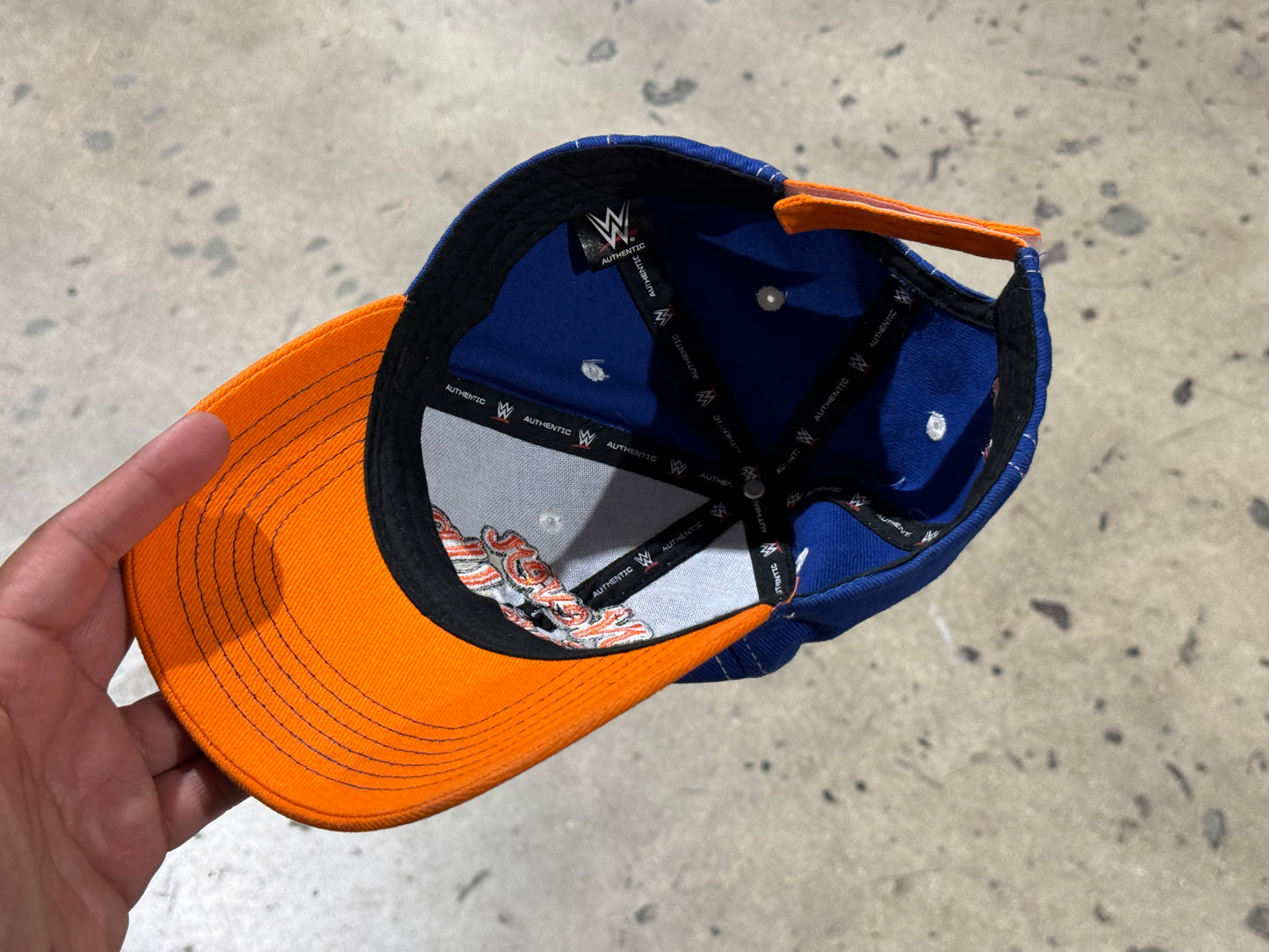 WWE John Cena Never Give Up Strapback Hat - Blue/Orange